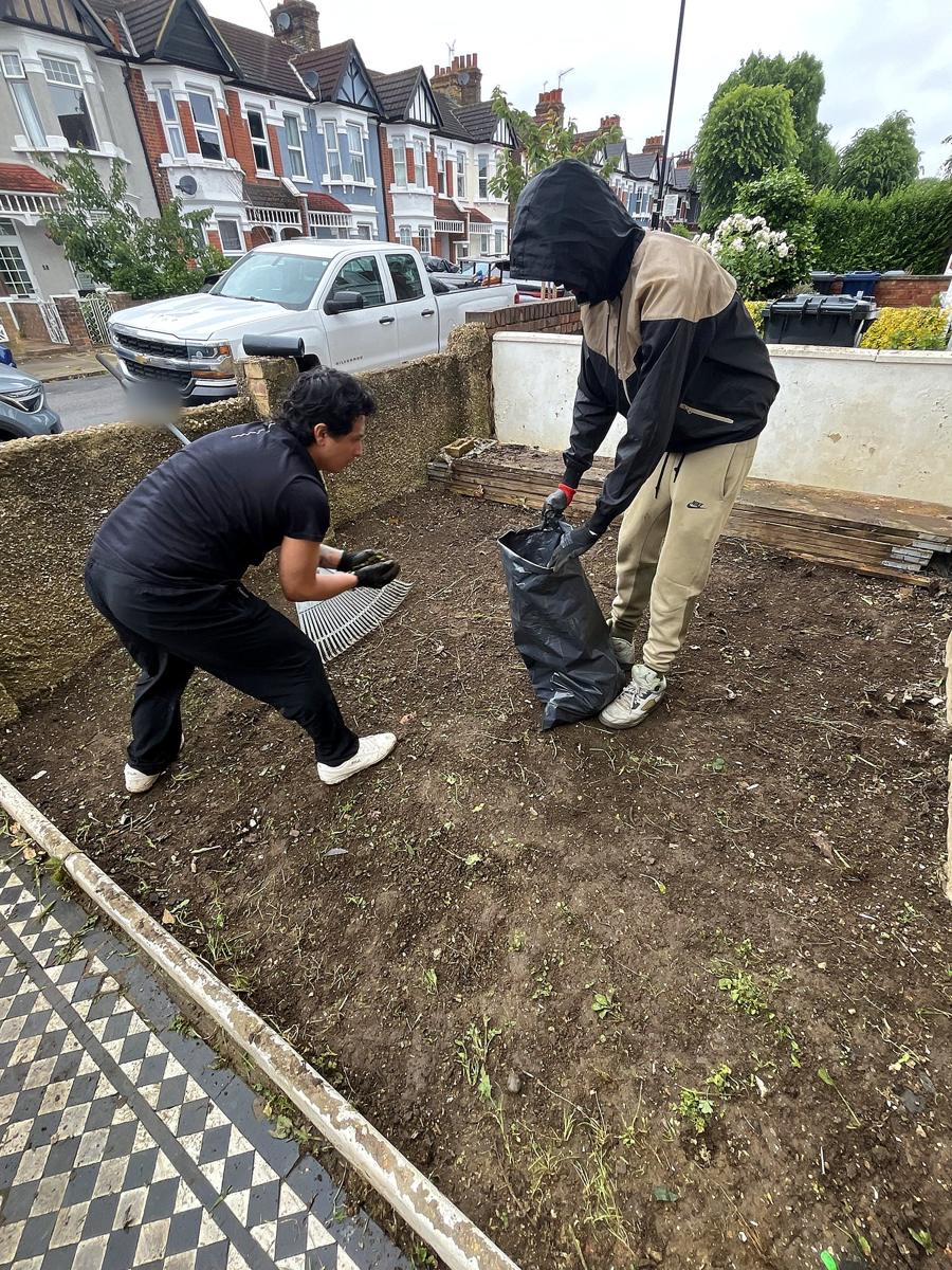 Front garden raked to bare soil