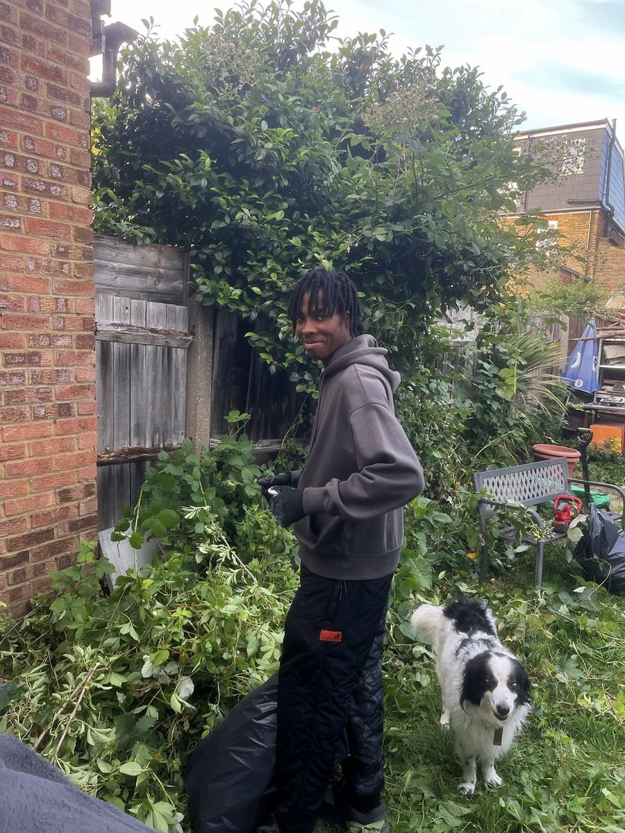 Crew member with Mr Big Mac in the garden