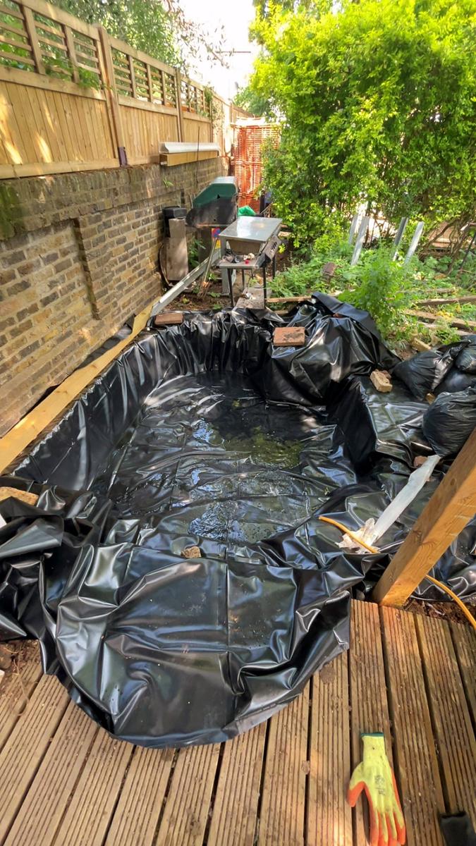 Pond liner in and starting to fill